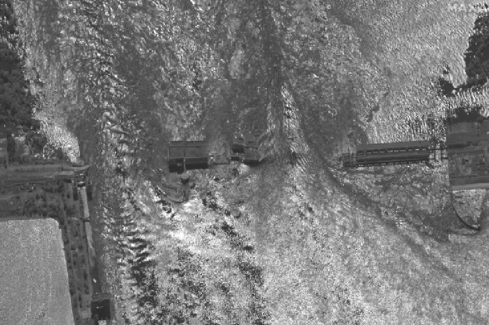 A handout satellite image made available by Maxar Technologies shows a closer view of the destroyed Nova Kakhovka dam and hydroelectric plant in the Kherson region, southern Ukraine, 06 June 2023. Ukraine has accused Russian forces of destroying a critical dam and hydroelectric power plant on the Dnipro River in the Kherson region along the front line in southern Ukraine on 06 June. A number of settlements were completely or partially flooded, Kherson region governor Oleksandr Prokudin said on telegram. Russian troops entered Ukraine on 24 February 2022 starting a conflict that has provoked destruction and a humanitarian crisis. EPA-EFE/MAXAR TECHNOLOGIES HANDOUT 