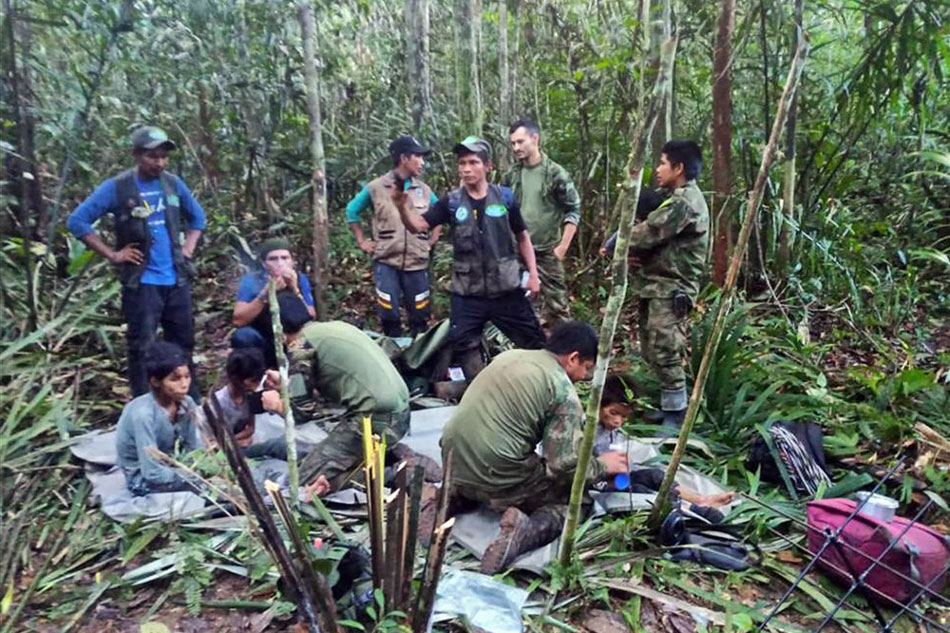  A handout photo made available by the Military Forces of Colombia shows soldiers and indigenous people as they attend to the children rescued after 40 days in the jungle, in Guaviare, Colombia, on June 9, 2023. The four children who had been lost since May 1, 2023 in the jungles of southern Colombia after the plane in which they were traveling along with three adults crashed, were found alive by soldiers who participated in their search, official sources reported. Military Forces of Colombia, EPA-EFE