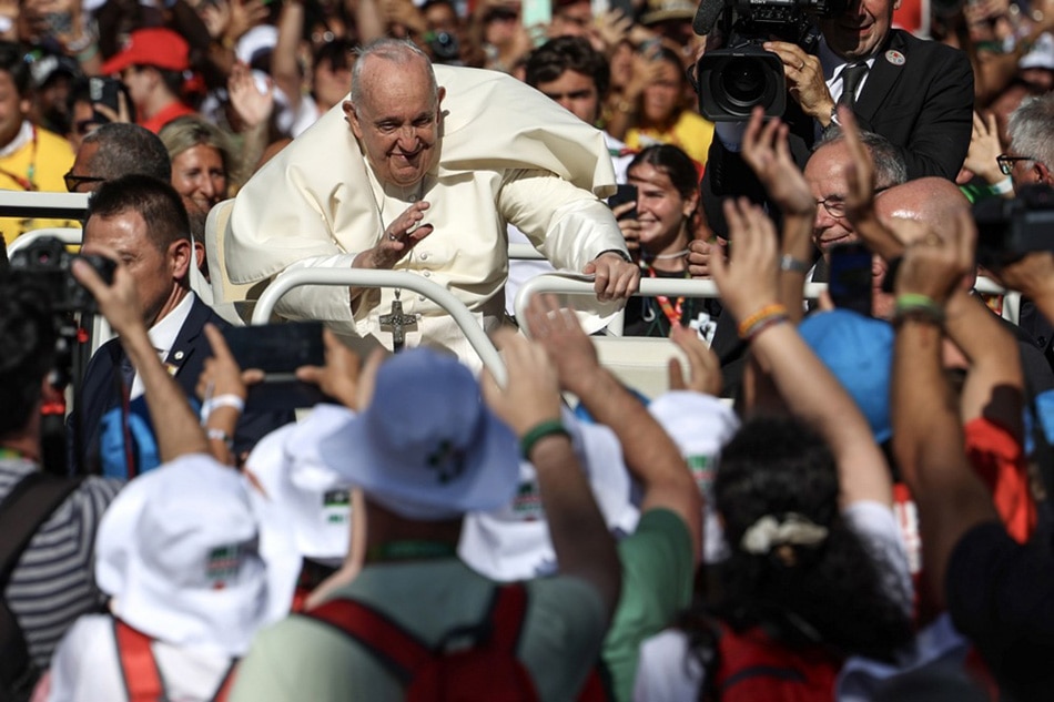 Half million youths give pope rock star in Lisbon ABSCBN News