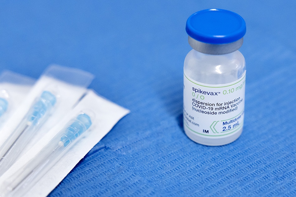 A bottle containing the new Moderna Spikevax mRNA COVID 19 vaccine stands ready to be drawn into syringes at the centre of the Geneva University Hospitals (HUG), that opened for the public to get the forth booster dose againt COVID, in Geneva, Switzerland, 10 October 2022. The forth dose booster is available for all persons with the new Moderna Spikevax mRNA COVID-19 vaccine. EPA-EFE/SALVATORE DI NOLFI