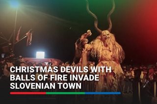 Christmas devils with balls of fire invade Slovenian town