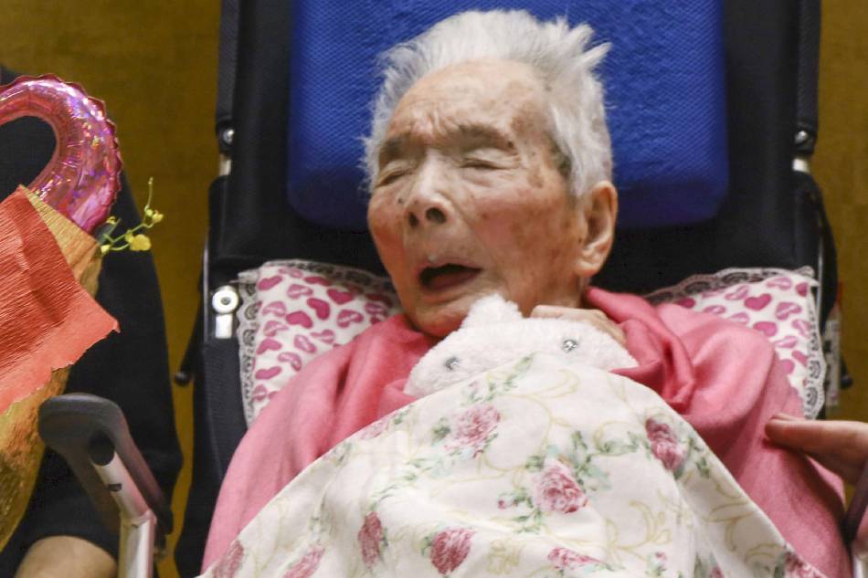 Photo taken in Kashiwara in Osaka Prefecture, western Japan, on June 30, 2022, shows 115-year-old Fusa Tatsumi, who became Japan