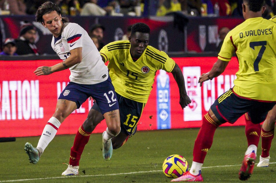 US defender John Tolkin (L) and Colombia defender Yilmar Velazquez (R) fight for possession of the ball during the first half of the International Friendly soccer match between the US and Colombia at Dignity Health Sports Park in Carson, California, USA, 28 January 2023. Kyle Grillot, EPA-EFE.