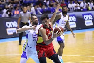 San Miguel fends off Magnolia to earn share of lead