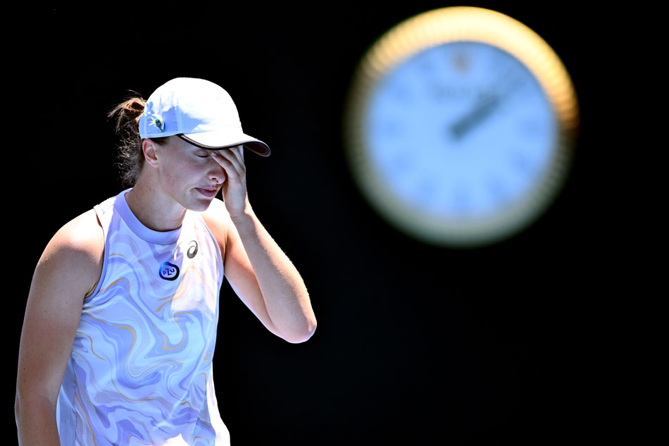 Iga Swiatek of Poland reacts following her loss to Elena Rybakina of Kazakhstan during her 4th round match during the 2023 Australian Open tennis tournament at Melbourne Park in Melbourne, Australia, 22 January 2023. Joel Carrett, EPA-EFE.
