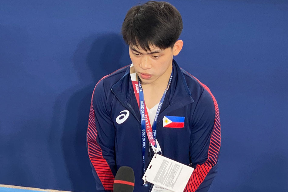 Filipino Olympian Carlos Edriel Yulo is interviewed after competing in the artistic gymnastics men