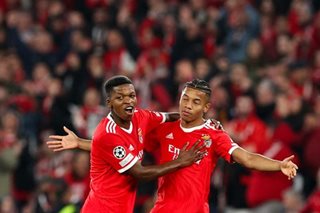 Football: Benfica reach Champions League quarters