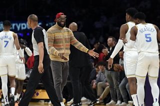 LOOK: LeBron James joins Lakers in bench