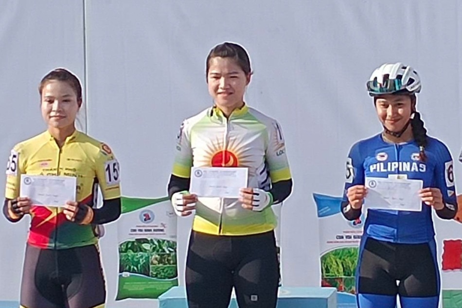 Mhay Ann Linda stands on the podium for her third place finish in the first intermediate sprint in Stage 7 on Tuesday. Handout