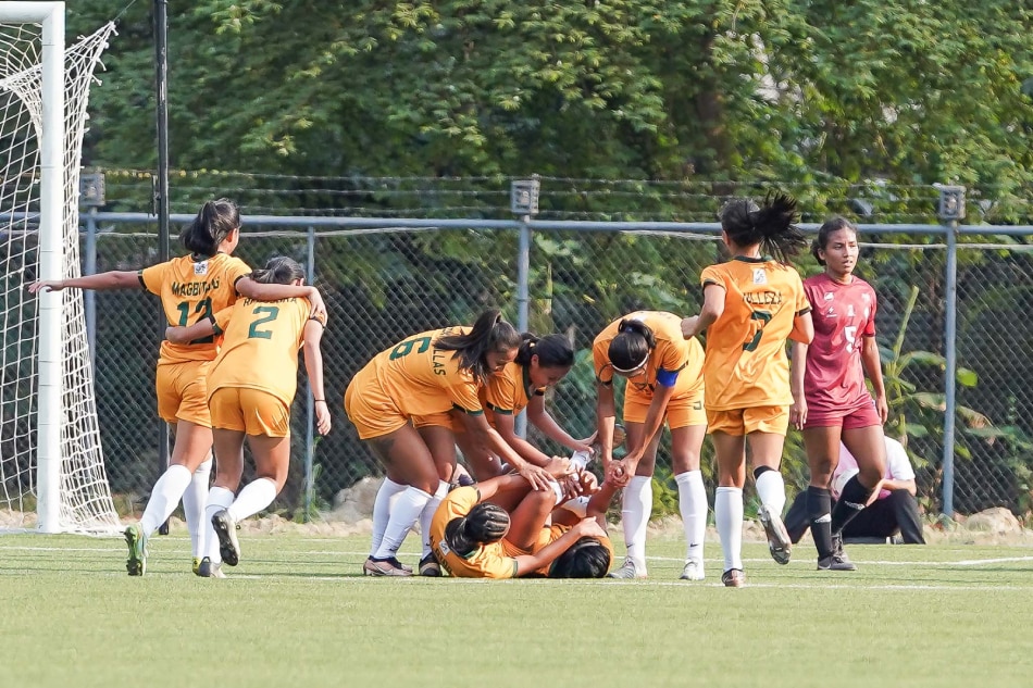 FEU celebrates after Carmela Altiche score in the 37th minute against UP in the UAAP Season 85 women's football tournament. UAAP Media.