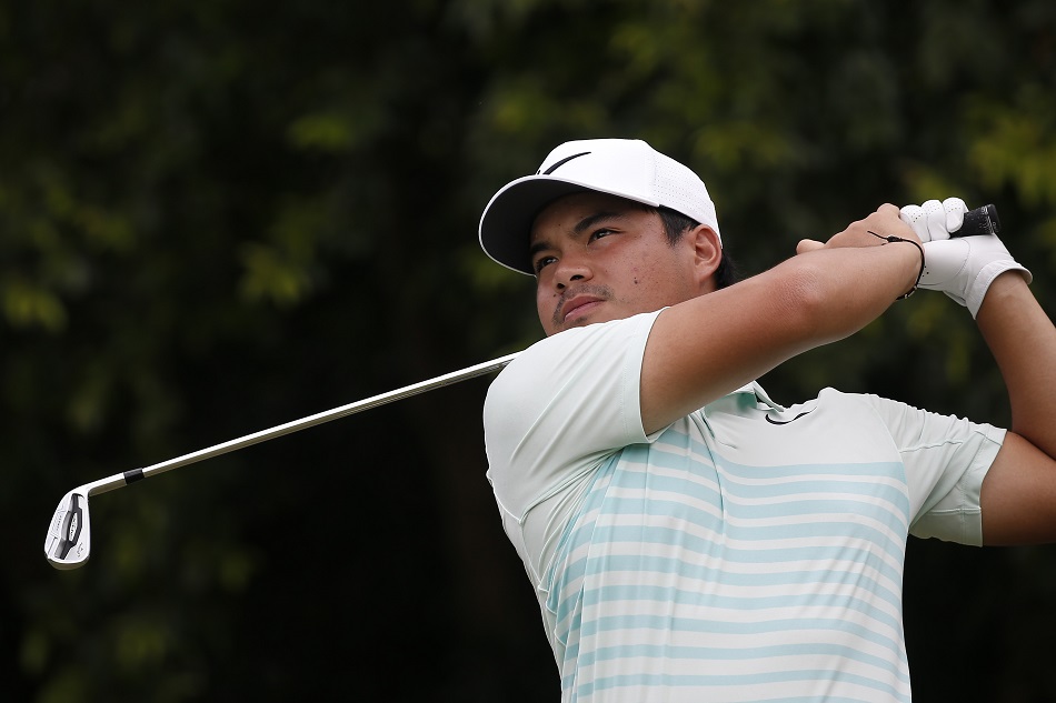 Miguel Tabuena of the Philippines tees off from the eighth hole of the Serapong Course during the SMBC Singapore Open Men's Golf on Sentosa Island, Singapore, January 18, 2018. Wallace Woon, EPA-EFE/File photo.