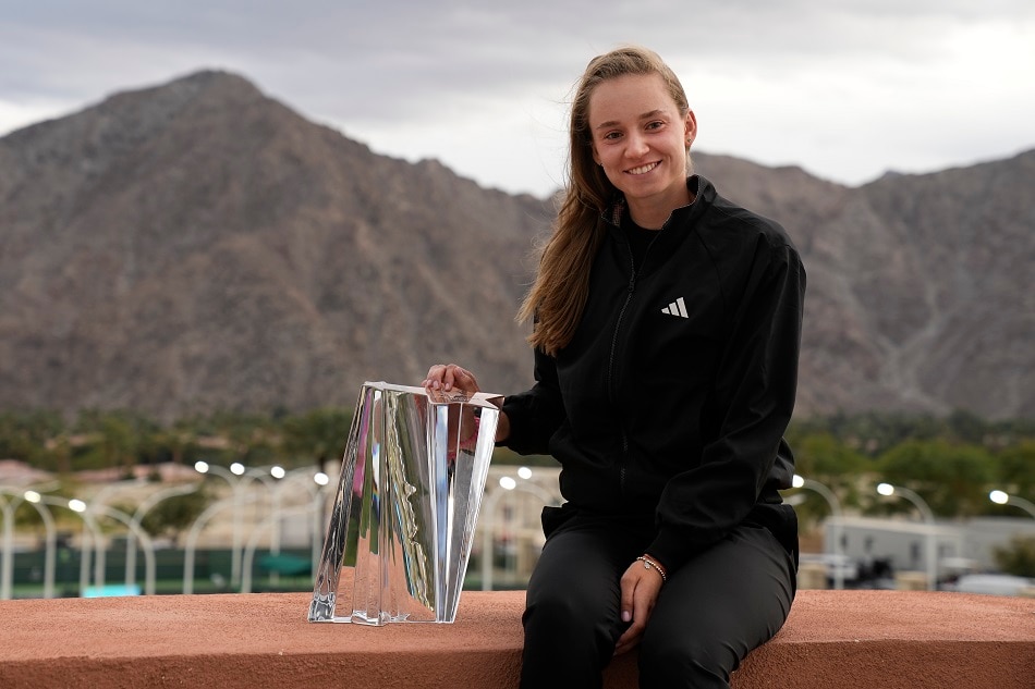 Elena Rybakina of Kazakhstan with the championship trophy after her match against Aryna Sabalenka of Belarus following the women's finals of the BNP Paribas Open tennis tournament at the Indian Wells Tennis Garden in Indian Wells, California, USA, March 19, 2023. Ray Acevedo, EPA-EFE.