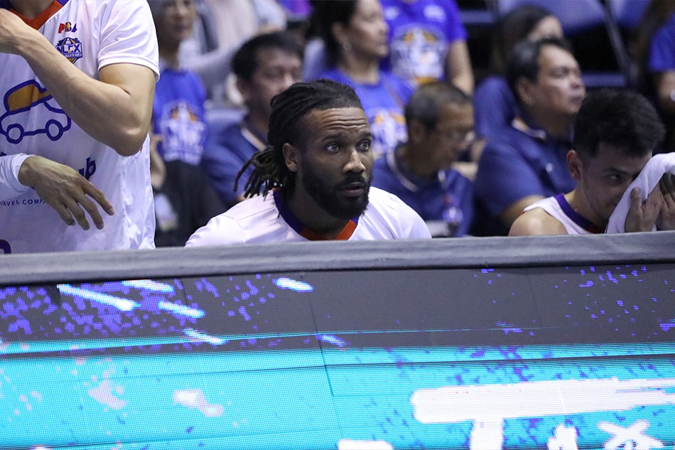 NLEX import Wayne Selden sits at the team bench during their PBA Governors' Cup quarterfinal game against Barangay Ginebra. Selden did not play against the Gin Kings due to a foot injury. PBA Images.