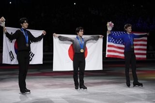 Japan's Uno retains world figure skating title