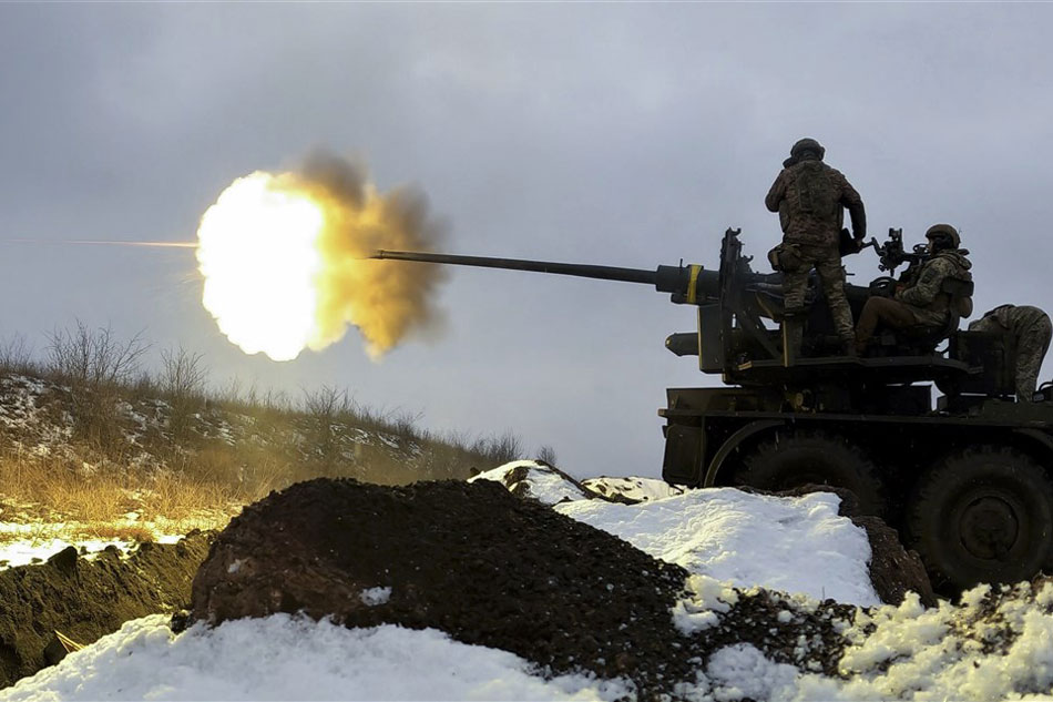 Ukrainian soldiers fire an anti-aircraft gun near Bakhmut, Donetsk region, eastern Ukraine, on February 4, 2023, amid Russia's invasion. Sergey Shestak, EPA-EFE/file 