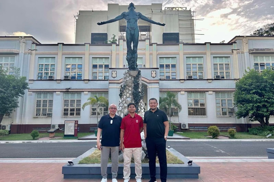Top high school star Jared Bahay (center) with UP head coach Goldwin Monteverde (left) and UP men's basketball program director Bo Perasol (right). Handout photo.