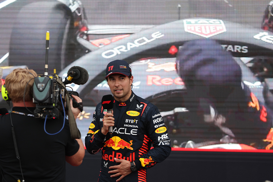 Mexican Formula One driver Sergio Perez of Red Bull Racing gives an interview as his reaction is shown on the screen after winning the 2023 Formula One Grand Prix of Azerbaijan at the Baku City circuit, Azerbaijan, April 30, 2023. Ali Haider, EPA-EFE.