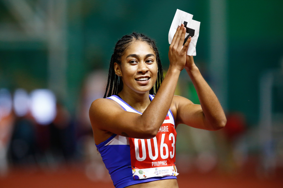 Kristina Marie Knott of the Philippines reacts after winning the Women