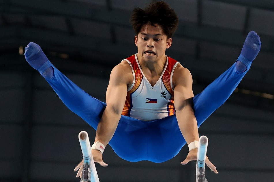 Carlos Yulo during the parallel bars event at the 32nd Southeast Asian Games in Cambodia on May 9, 2023. POC/PSC Media handout
