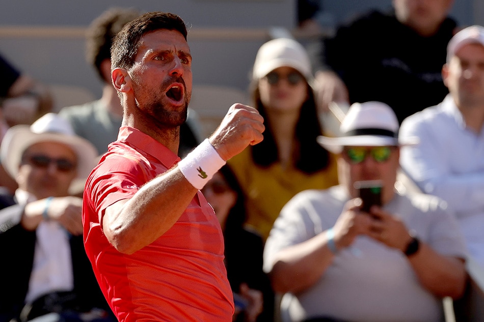 Novak Djokovic of Serbia celebrates a point during the Men's Singles 3rd round match against Alejandro Davidovich Fokina of Spain during the French Open Grand Slam tennis tournament at Roland Garros in Paris, France, June 2, 2023. Teresa Suarez, EPA-EFE