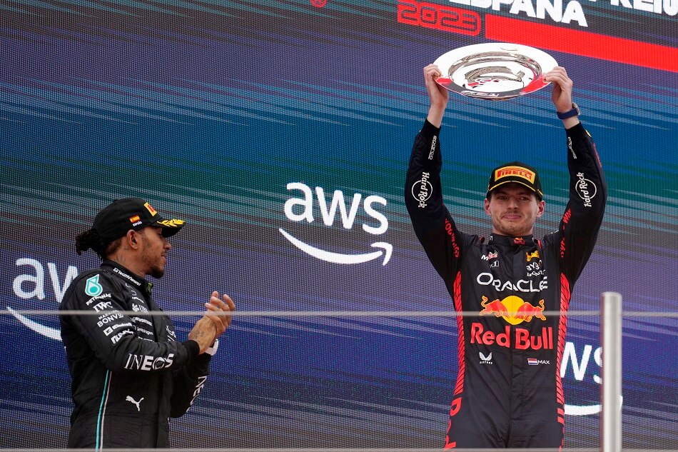 Winner Dutch Formula One driver Max Verstappen (R) of Red Bull Racing celebrates with second-placed British driver Lewis Hamilton of Mercedes on the podium after the Formula 1 Grand Prix of Spain 2023 at the Circuit de Barcelona-Catalunya, in Barcelona, Spain, June 4, 2023. Siu Wu, EPA-EFE.