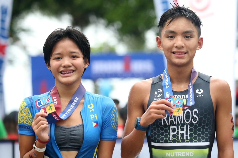 Zabelle Eugenio and Euan Ramos pose after their triumph in the IRONKIDS Philippines. Handout photo.