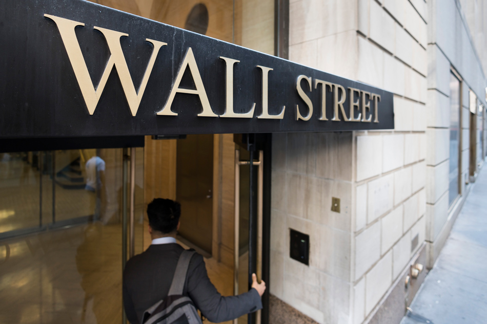  A sign on a building on Wall Street near the New York Stock Exchange in New York, New York, USA, June 13, 2022. Justin Lane, EPA-EFE/File.