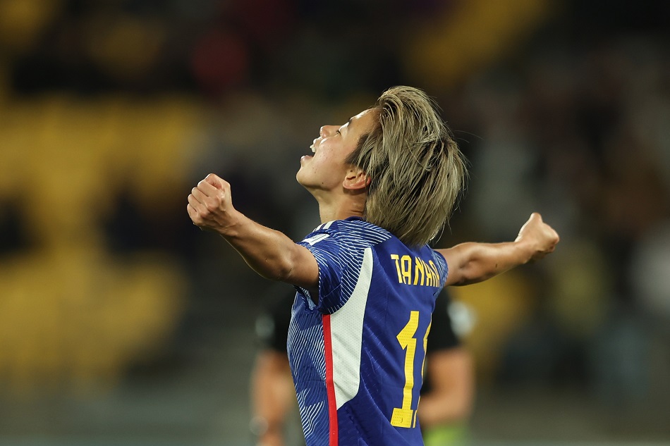 Mina Tanaka of Japan celebrates after scoring a goal during the FIFA Women