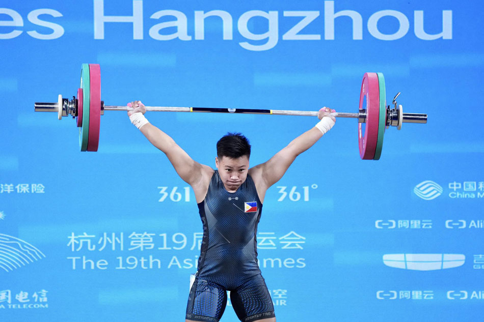 Filipina weightlifter Elreen Ando in action in the 19th Asian Games. POC-PSC Media Pool.