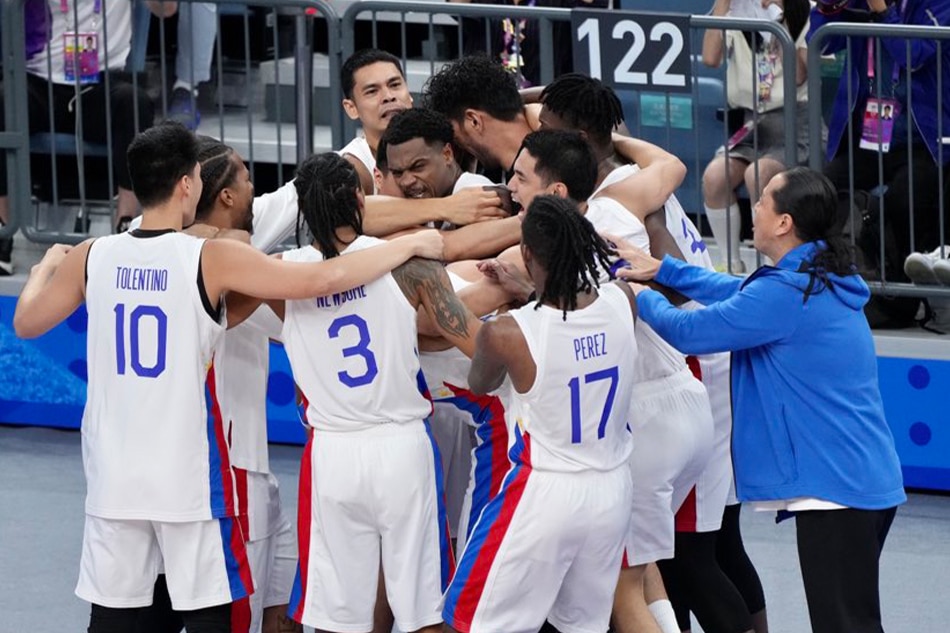 Justin Brownlee celebrates with his Gilas Pilipinas teammates after their come-from-behind win against China in their semifinal game in the 19th Asian Games on October 4, 2023 at the Hangzhou Olympic Sports Center in Hangzhou, China. POC-PSC Media Pool.