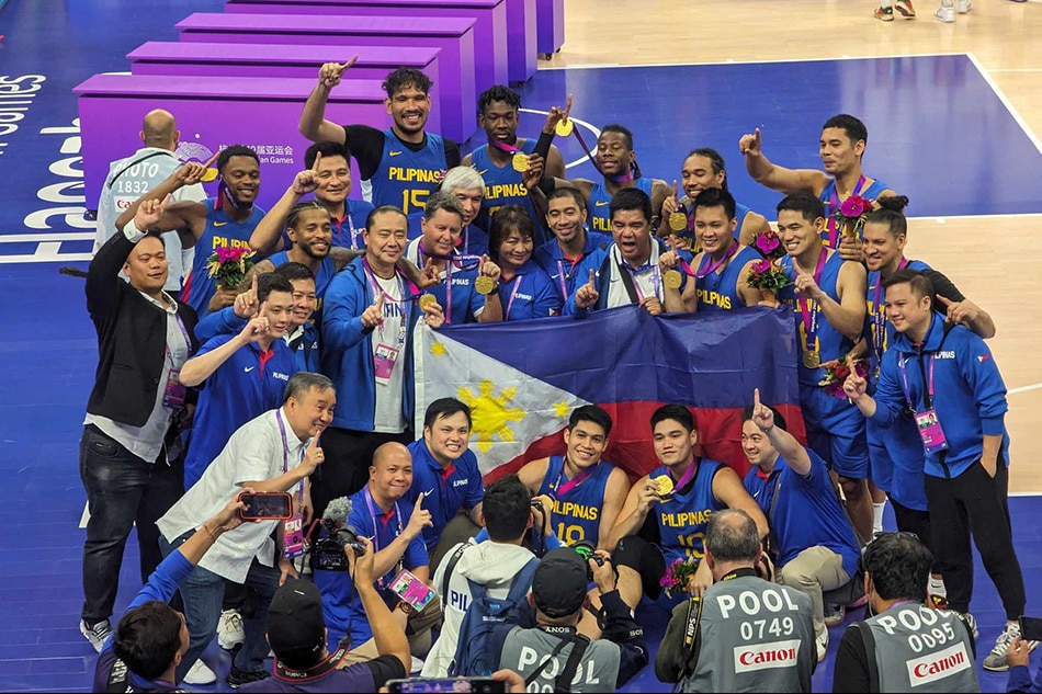 Gilas Pilipinas celebrates after their triumph in the gold medal game of the 19th Asian Games against Jordan. POC-PSC Media Pool.