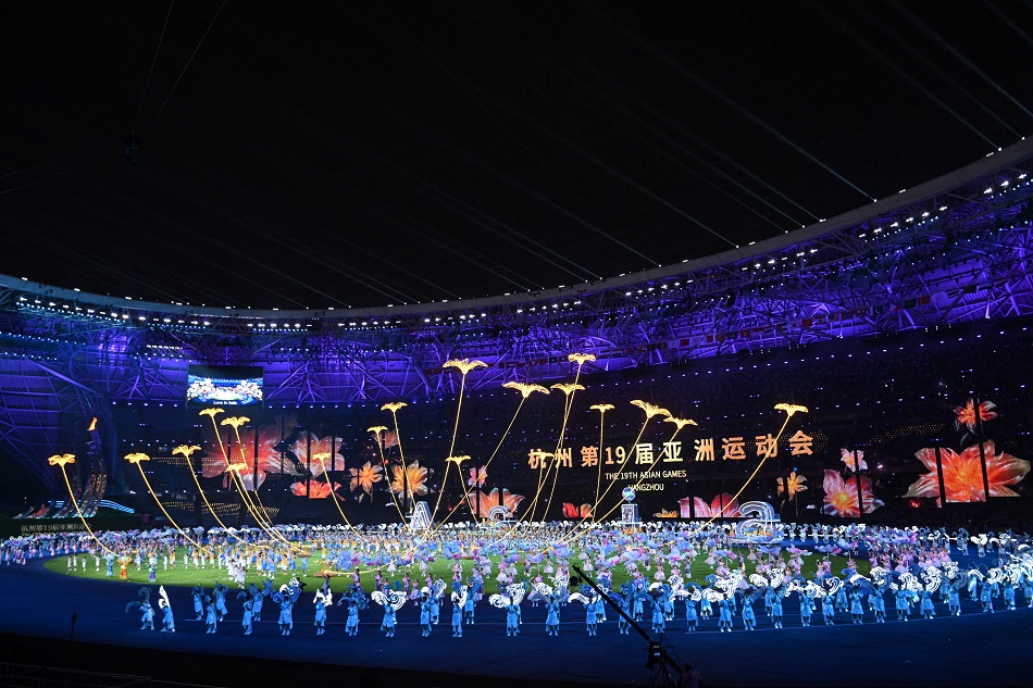 Performers take part in the closing ceremony of the 2022 Asian Games at the Hangzhou Olympic Sports Centre Stadium in Hangzhou in China