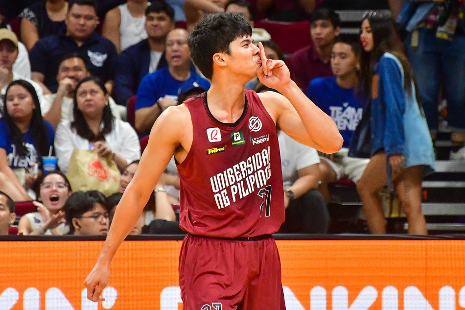 UP veteran CJ Cansino puts up a finger to shush the Ateneo crowd during their first round game in the UAAP Season 86 men