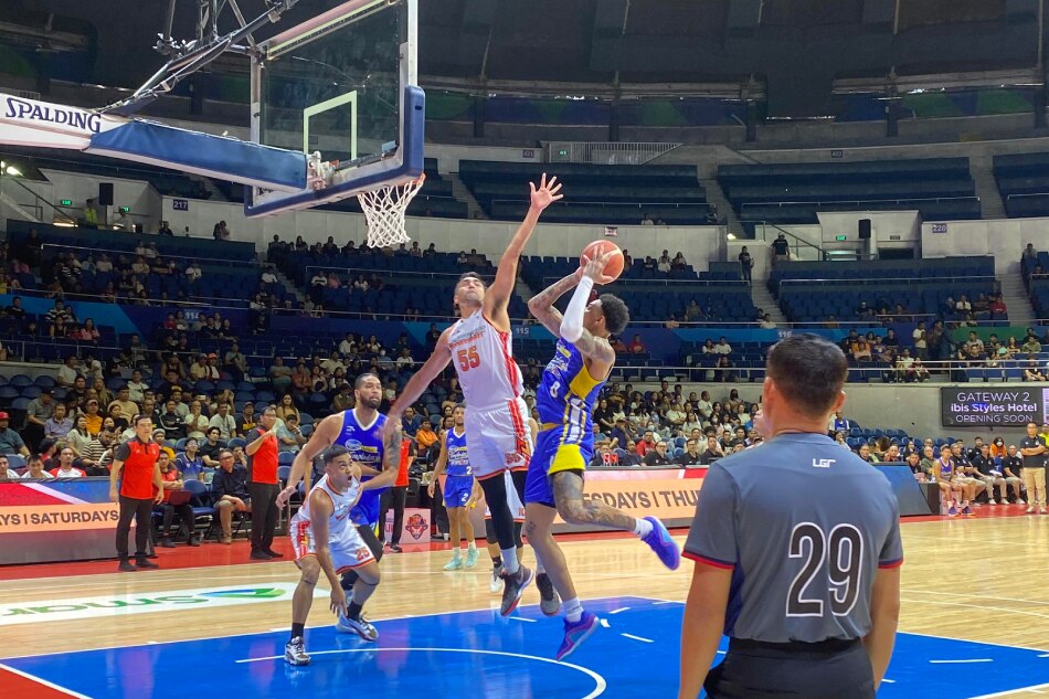 NorthPort's Venkatesha Jois tries to deny Magnolia's Tyler Bey during Friday's PBA action. Dennis Gasgonia, ABS-CBN News