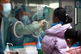 Soaring COVID cases shine light on China's healthcare gap