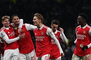 Football: Arsenal sink Spurs to move eight clear