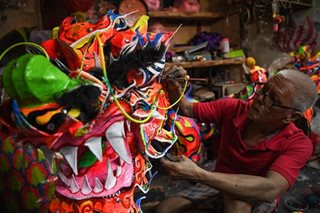 Dragon dance performers prepare for new lunar year