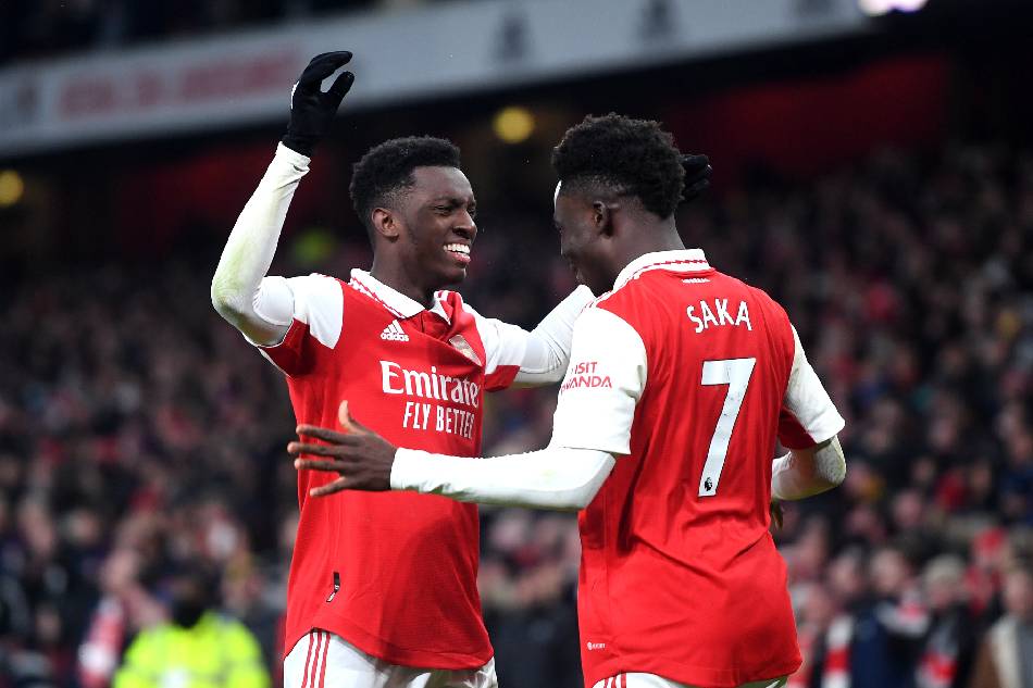 Arsenal's Eddie Nketiah (L) celebrates scoring the 3-2 lead with teammate Bukayo Saka during the English Premier League soccer match between Arsenal London and Manchester United in London, Britain, 22 January 2023. Andy Rain, EPA-EFE.