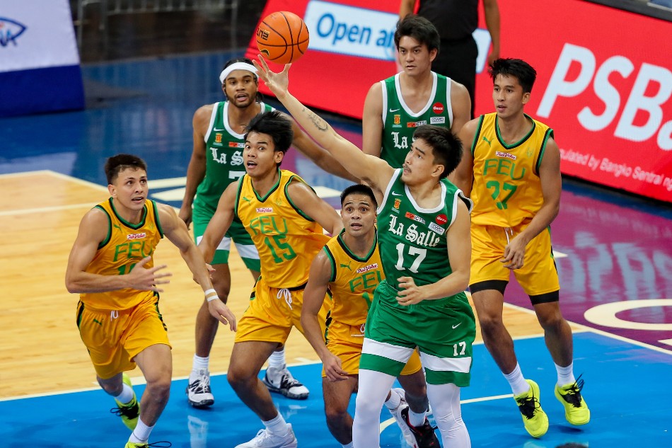 Kevin Quiambao (17) of the De La Salle Green Archers grabs the rebound during their match against the FEU Tamaraws in the UAAP Season 85 men’s basketball tournament held at the Mall of Asia Arena in Pasay City on October 15, 2022. George Calvelo, ABS-CBN News