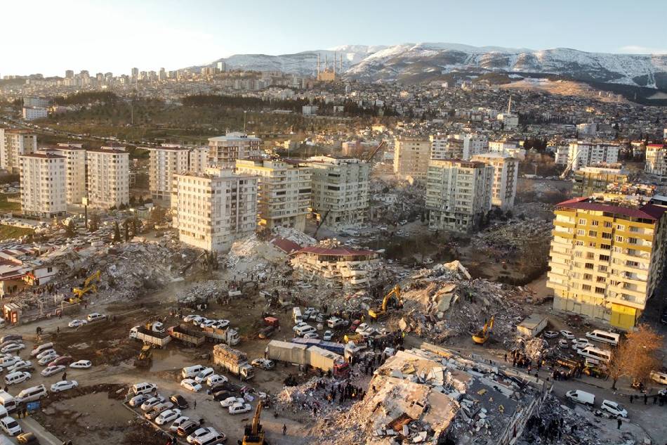 An aerial picture taken with a drone shows the rubble of collapsed buildings in the city of Kahramanmaras, southeastern Turkey, 08 February 2023. More than 11,000 people have died and thousands more are injured after two major earthquakes struck southern Turkey and northern Syria on 06 February. Authorities fear the death toll will keep climbing as rescuers look for survivors across the region. EPA-EFE/ABIR SULTAN