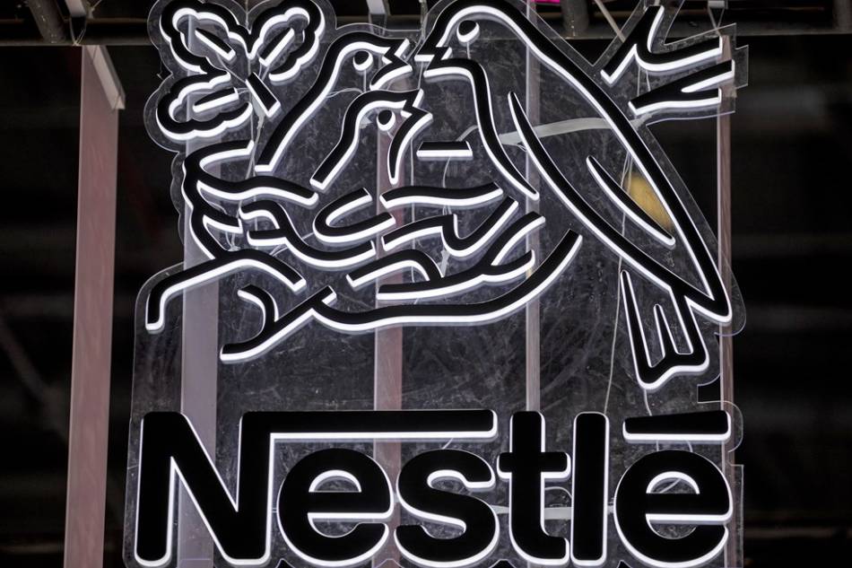 Nestle logo is seen at the 3rd China International Import Expo in Shanghai, China, 07 November 2020 (reissued 17 February 2021). EPA-EFE/ALEX PLAVEVSKI/FILE