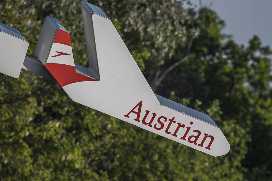 An Austrian Airlines (AUA) advertisement on display at the Vienna International Airport (VIC) in Schwechat, Austria, May 7, 2020. Christian Bruna, EPA-EFE/File