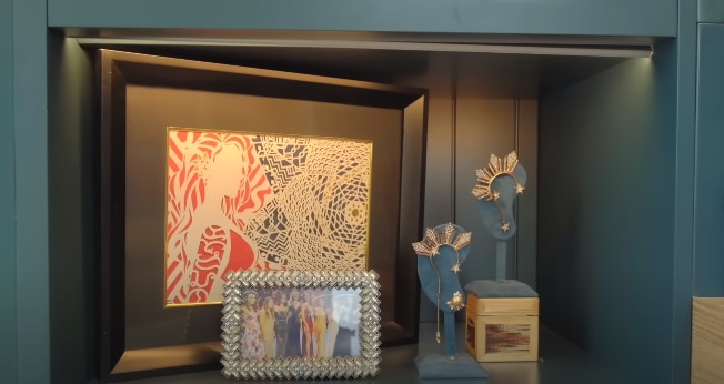 One of Gray's favorite displays in her living room features her two earcuffs from her stints in Bb. Pilipinas and Miss Universe in 2018. YouTube/Catriona Gray