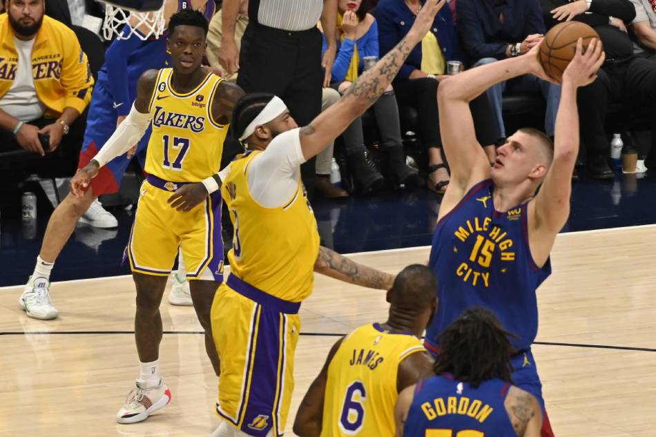 Jokic dominates as Nuggets hold off Lakers in opener | ABS-CBN News