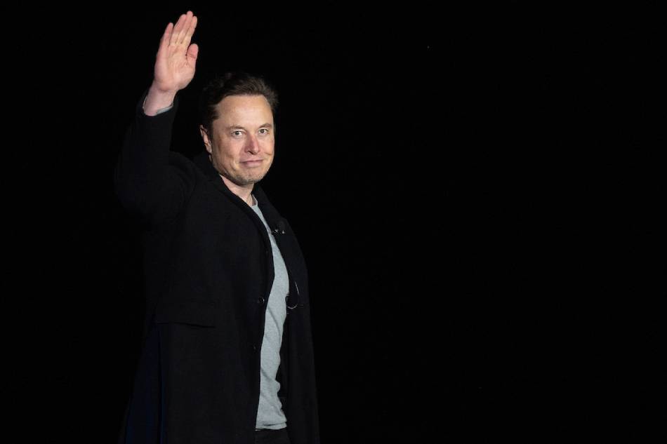 Elon Musk gestures as he speaks during a press conference at SpaceX's Starbase facility near Boca Chica Village in South Texas on Feb. 10, 2022. Billionaire entrepreneur Elon Musk delivered an eagerly-awaited update on SpaceX's Starship, a prototype rocket the company is developing for crewed interplanetary exploration. Jim Watson, AFP