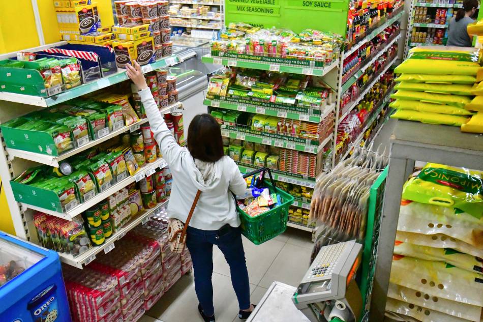A customer at a supermarket in Manila. Mark Demayo, ABS-CBN News/File