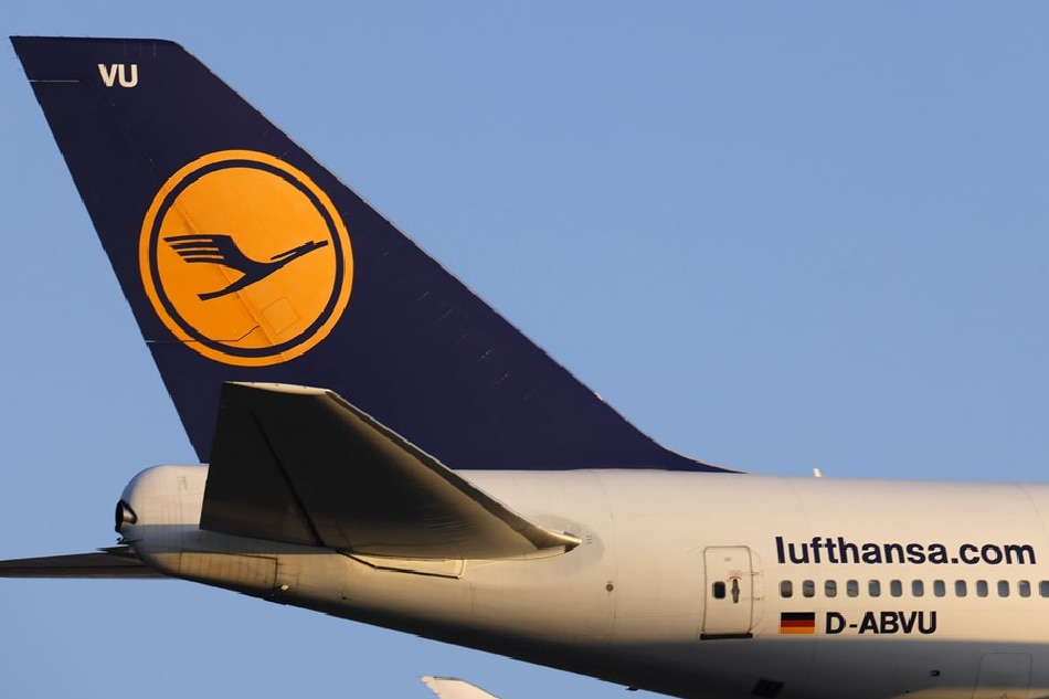 The logo of German airline Lufthansa on the tail of an airplane at the international airport in Frankfurt am Main, Germany, March 2, 2023. Ronald Wittek/EPA-EFE/FILE