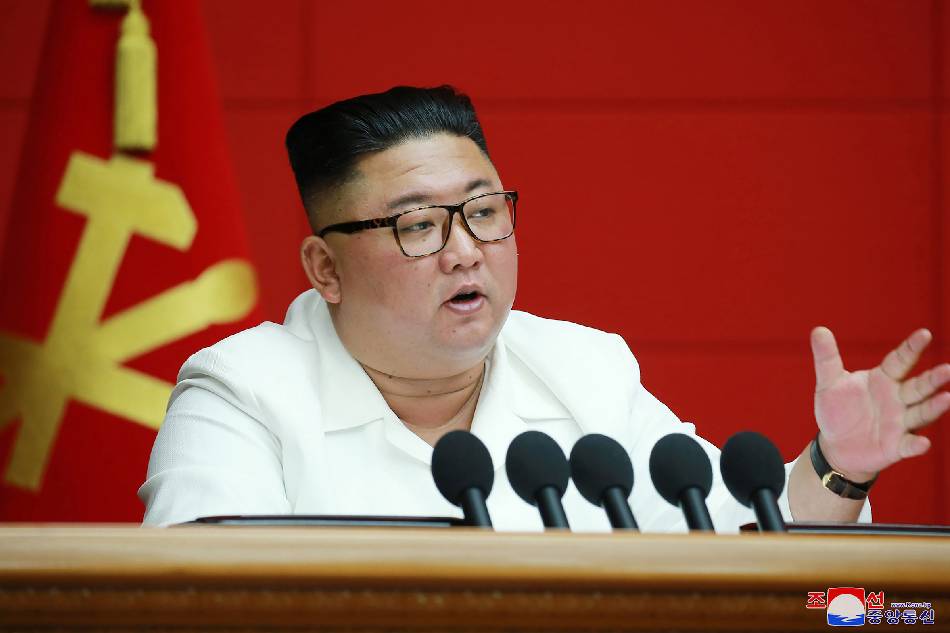 This picture taken on Aug. 19, 2020 and released from North Korea's official Korean Central News Agency (KCNA) on Aug. 20, 2020 shows North Korean leader Kim Jong Un speaking at the 6th Plenary Meeting of the 7th Central Committee of the Workers' Party of Korea at the office building of the Central Committee of the Party in Pyongyang. KCNA via KNS/AFP 