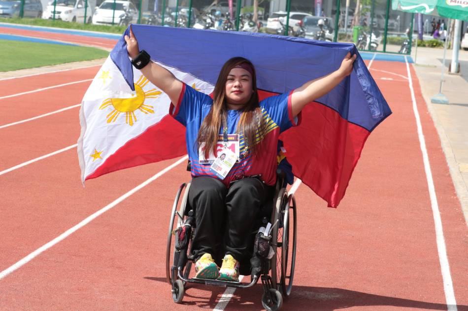 Cendy Asusano celebrates after winning gold in the women's javelin throw F54 event of the 12th ASEAN Para Games. PSC/POC Media.