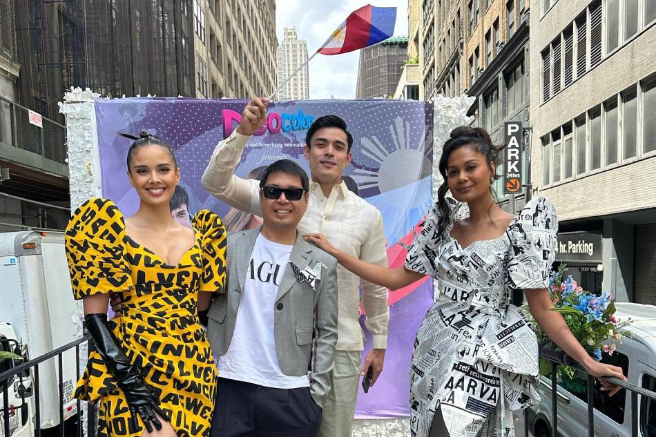 Megan Young (leftmost) and Venus Raj (rightmost) pose for a photo with designer Cherry Veric (second from left) and actor Xian Lim (second from right) during the Philippine Independence Day parade in New York. Instagram/@meganbata